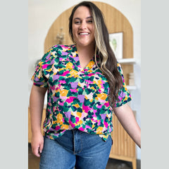 Double Take Full Size Printed V-Neck Short Sleeve Blouse